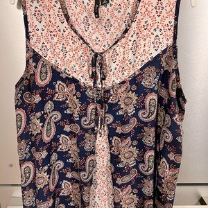 New Directions brand navy, sleeveless, flowing blouse.